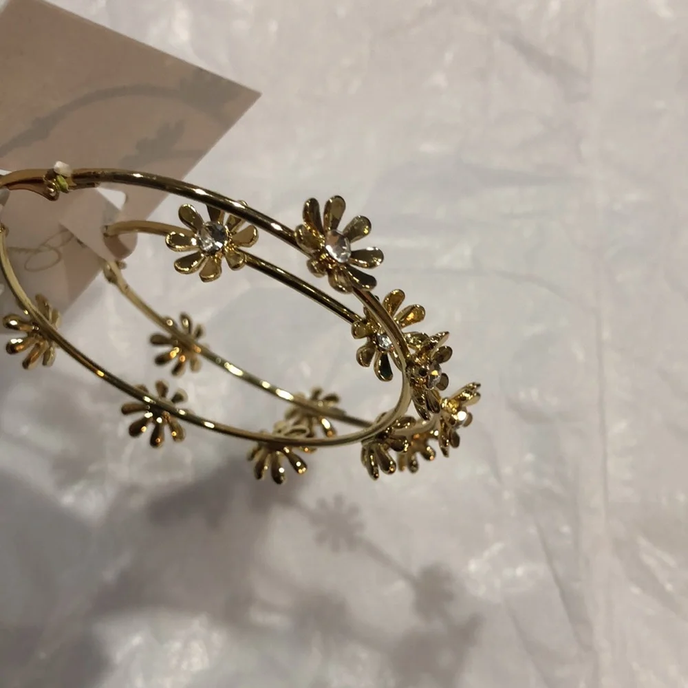 Jessica‎ Simpson cubic zirconia studded flower gold plated hoop earrings new